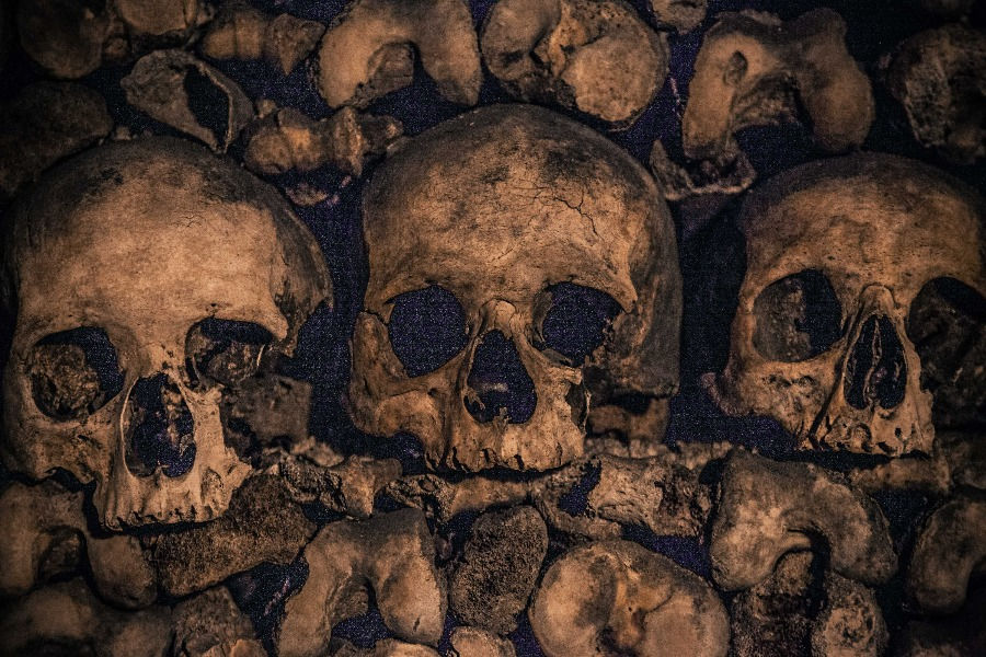 The stacked skulls and bones in Paris's underground catacombs are a great thing to do in Paris in the winter. ©alonzowright