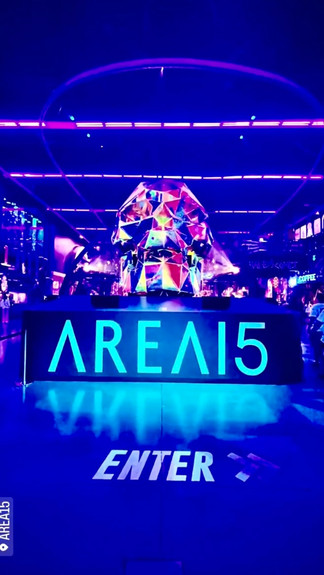 The entrance to Area 15 in Las Vegas with black lights and an enormous skull art piece, one of the things to do in Vegas with kids featured in Manifesting Travel.
