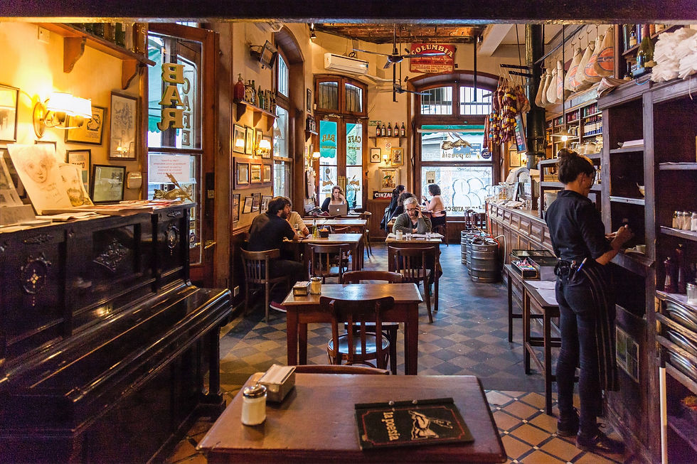 Interior view of a cafe with patrons in Buenos Aires, Argentina