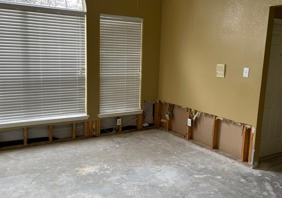 Drywall repairs from broken pipe flooding