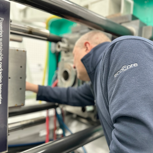 Bockatech development engineer fitting a new mould inside the new injection moulding machine