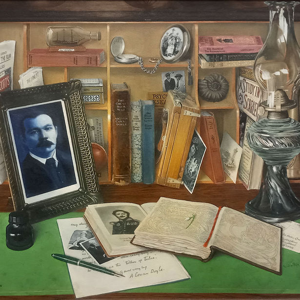 A desktop featuring mementos from the life of Arthur Conan Doyle, the creator of Sherlock Holmes