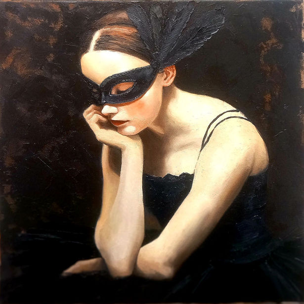A young ballerina resting her head on her hand in a black tutu and black feather head dress and black mask