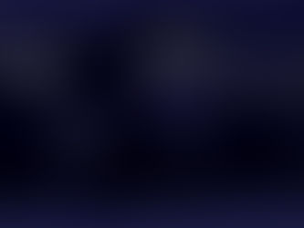 World map at night showing glowing areas of city lights across continents against a dark backdrop. Illuminated regions indicate population density.