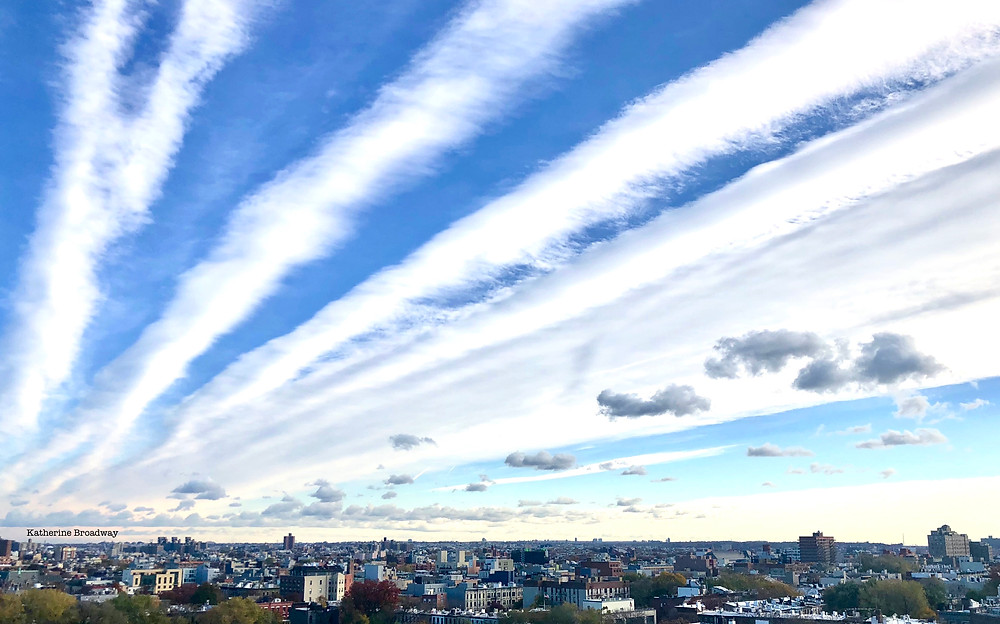 Image of clouds against bright blue sky. Raleigh Psychotherapy, Counseling, Pain, Katherine Broadway