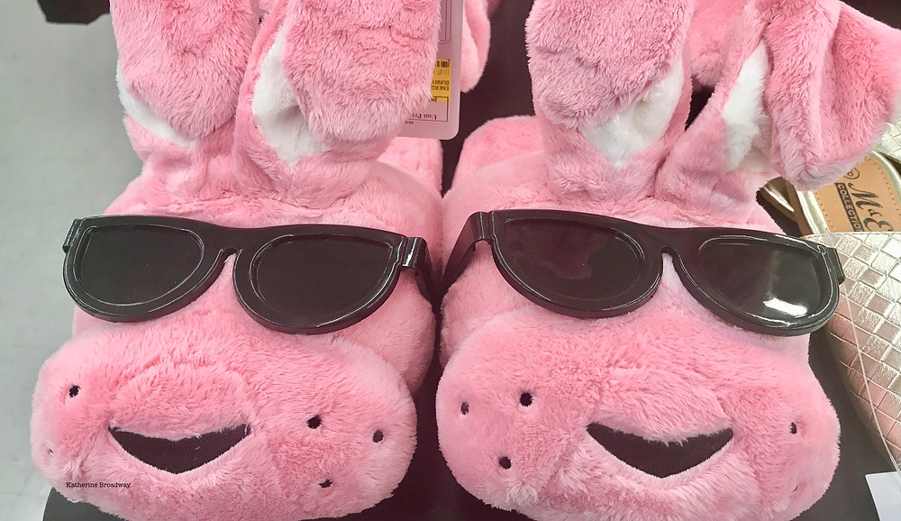 Image of 2 pink bunny slippers with black sunglasses. Raleigh Psychotherapy, counseling, codependency, Katherine Broadway