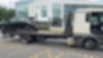 Flatbed truck providing vehicle recovery in Edinburgh.