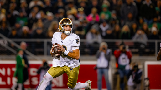 CJ Carr rolls out right