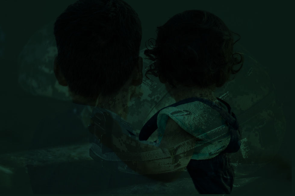 A moody collage of a father and toddler's silhouettes against a dark background with army helmets