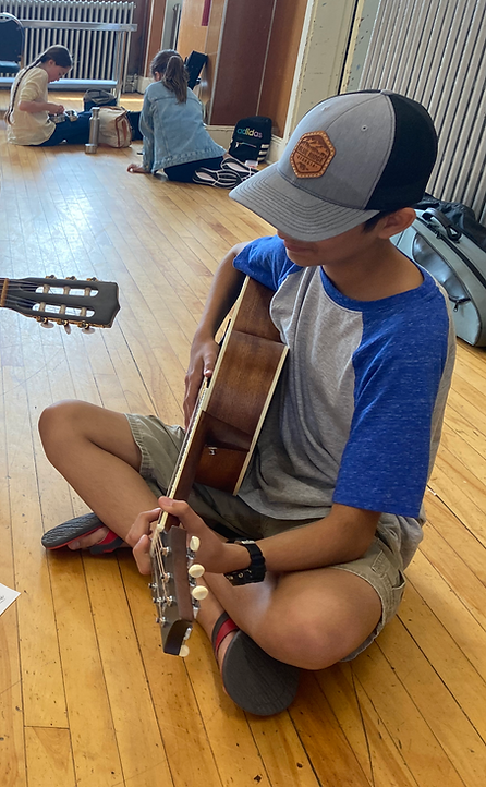 Children learning guitar at Music Intensive summer camp Halifax 2026