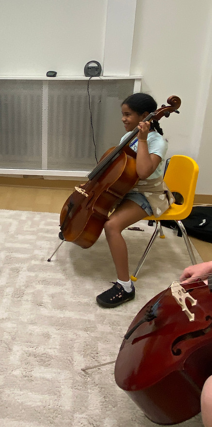 Teen learning cello at Scotia Suzuki School in Halifax