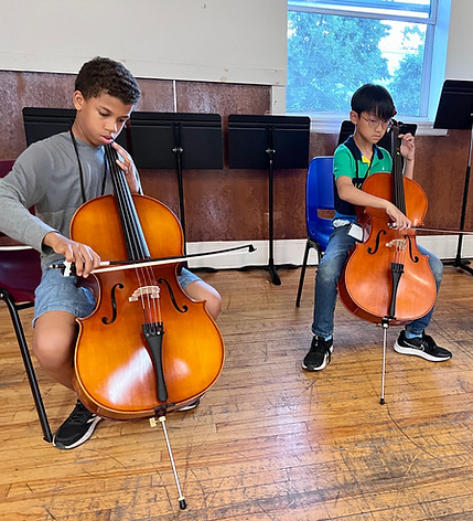 Teen learning cello at Scotia Suzuki School in Halifax