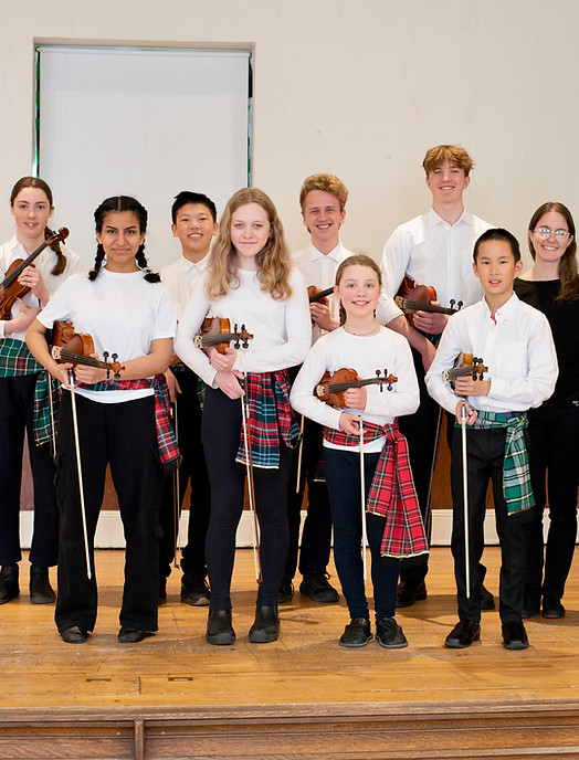 Teen learning violin at Scotia Suzuki School in Halifax