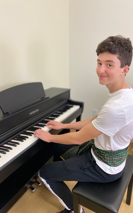 Students exploring piano at Music Summer Lessons in SSSM Halifax