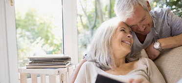 Senior couple hugging