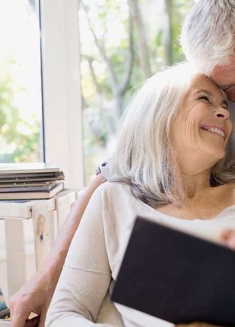 Senior couple hugging