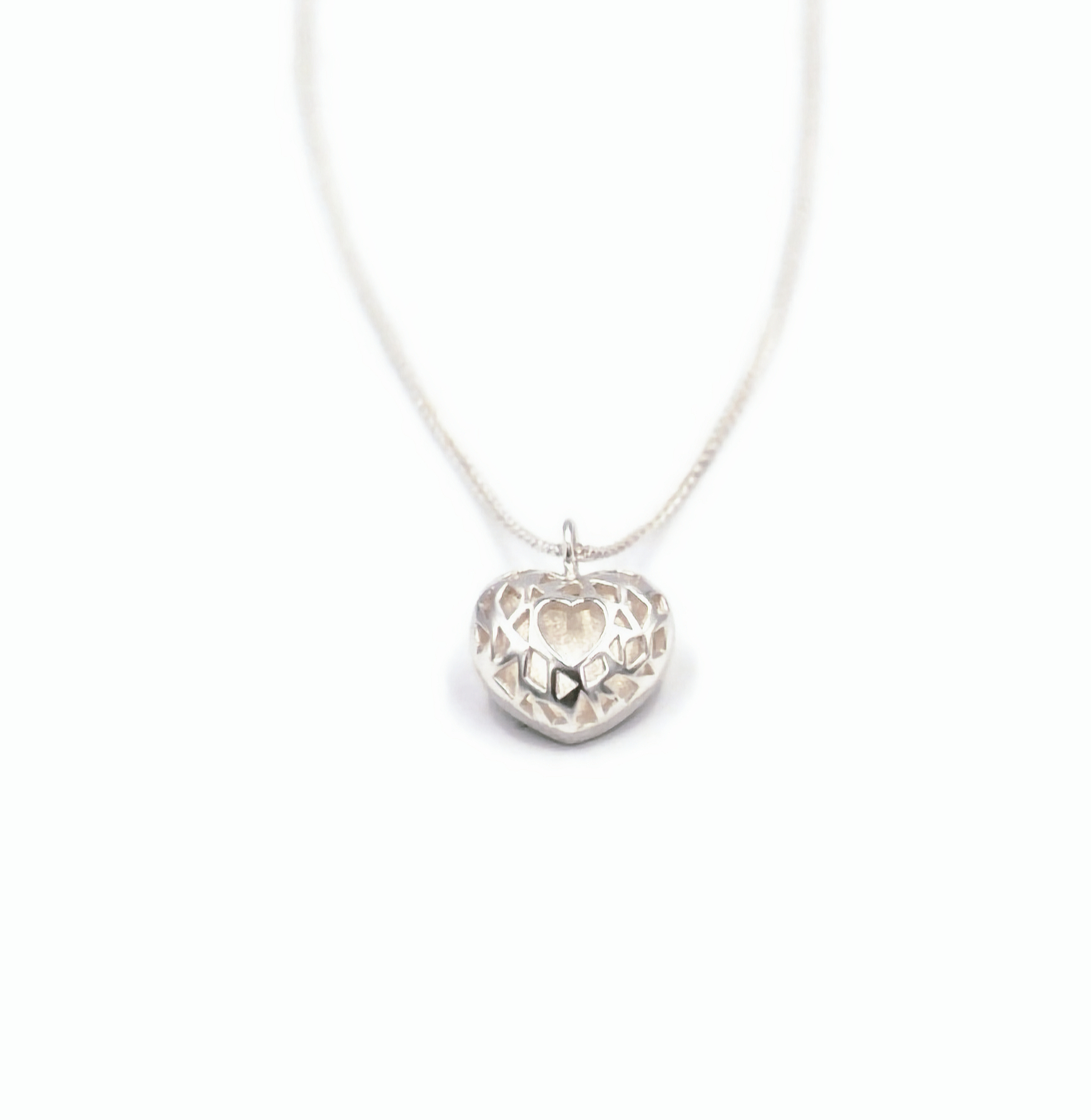 Pendentif cœur argenté