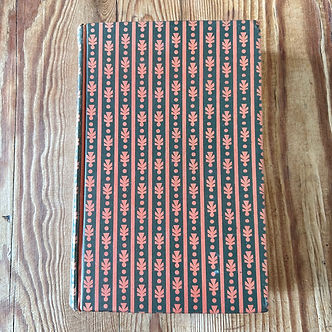 An antique book on a desk
