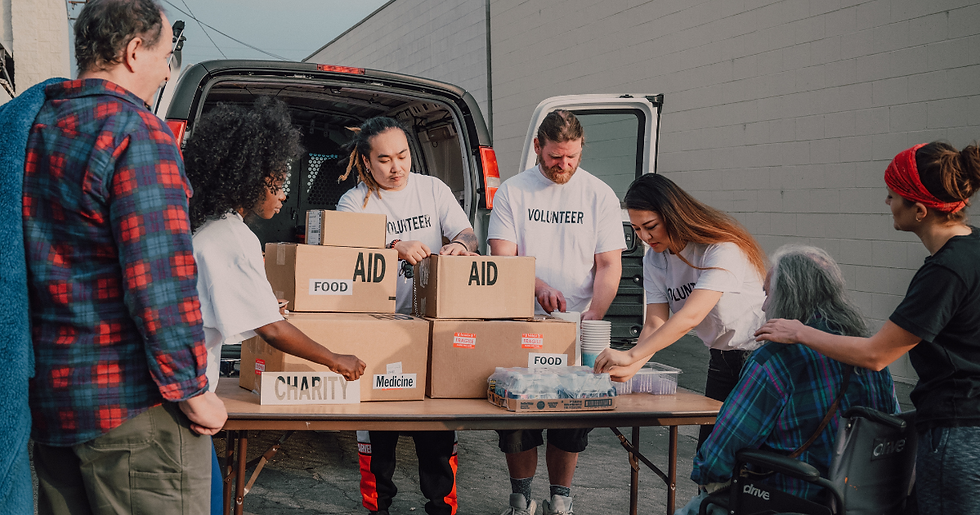People engaged in a skill-building activity, such as taking an online course on a computer or volunteering in a community setting.