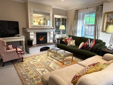 The woodburner is cosy for winter stays at Abbott Moss