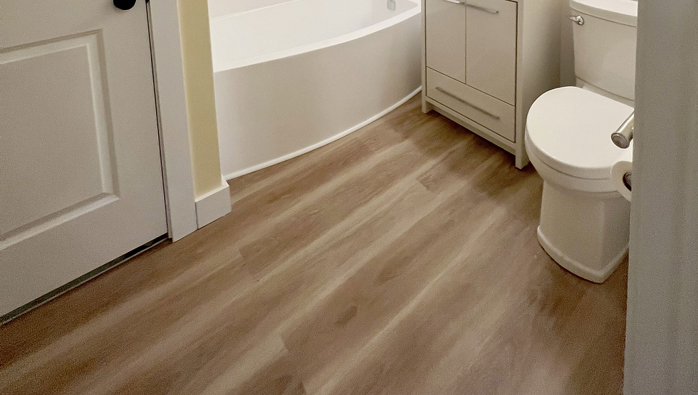 Modern Toronto bathroom renovation with wood-look flooring