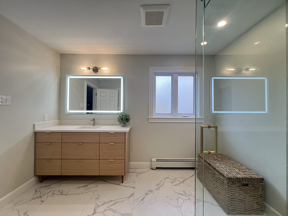 Modern Toronto bathroom renovation with wood vanity and LED mirror.