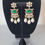 Thumbnail: Silver replica earrings with moissanites and green doublet stone