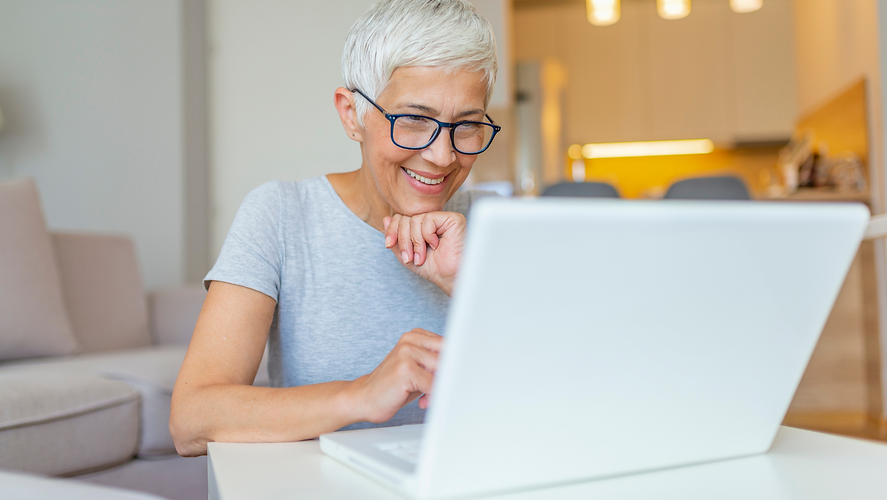 questions about mediacare, woman doing research on a laptop