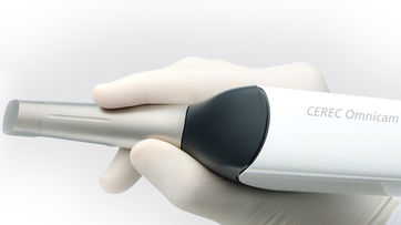 cer-product-image-cerec-omnicam-with-hand.jpeg