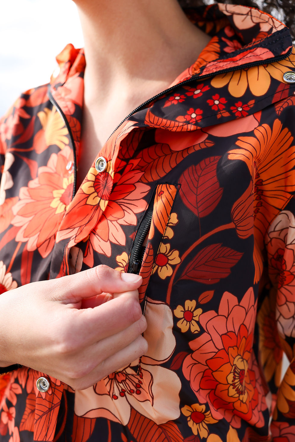 Thumbnail: tangerine dahlia eco rain jacket