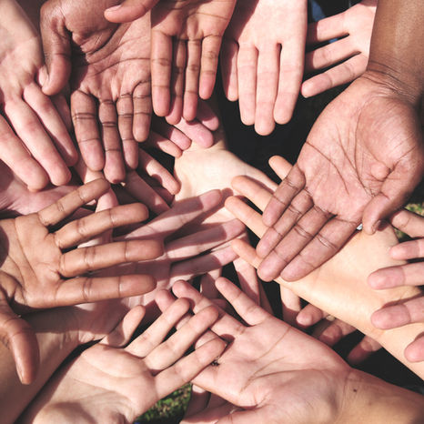 Image of many hands connecting, for link to page: Nonprofit Organizations