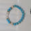 Thumbnail: Turquoise and white quartz with gold detail bracelet 