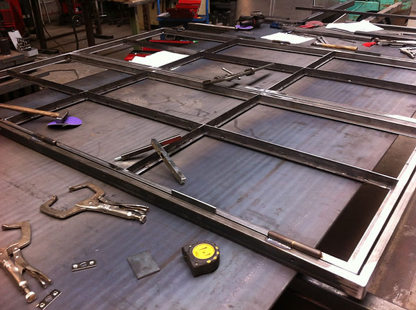 Staal deur glas lassen atelier