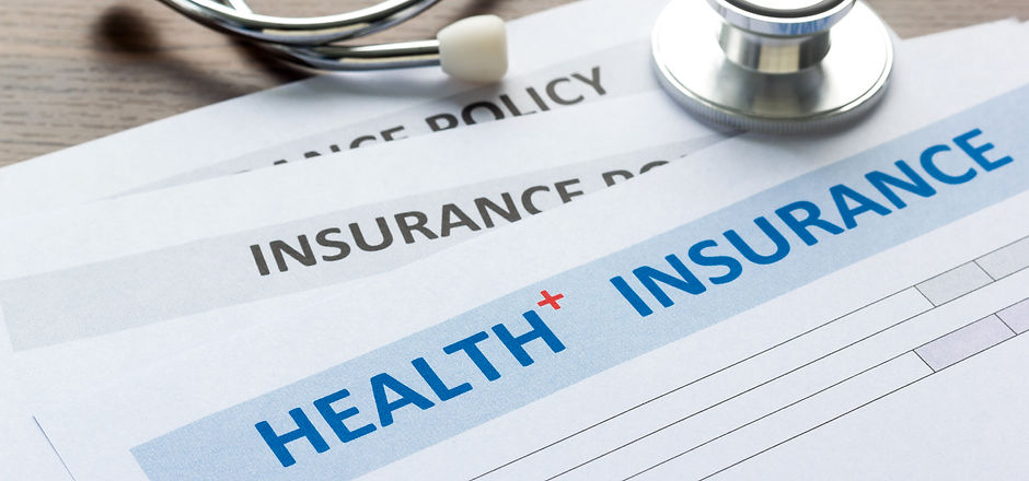 Health insurance form with stethoscope in top view.jpg
