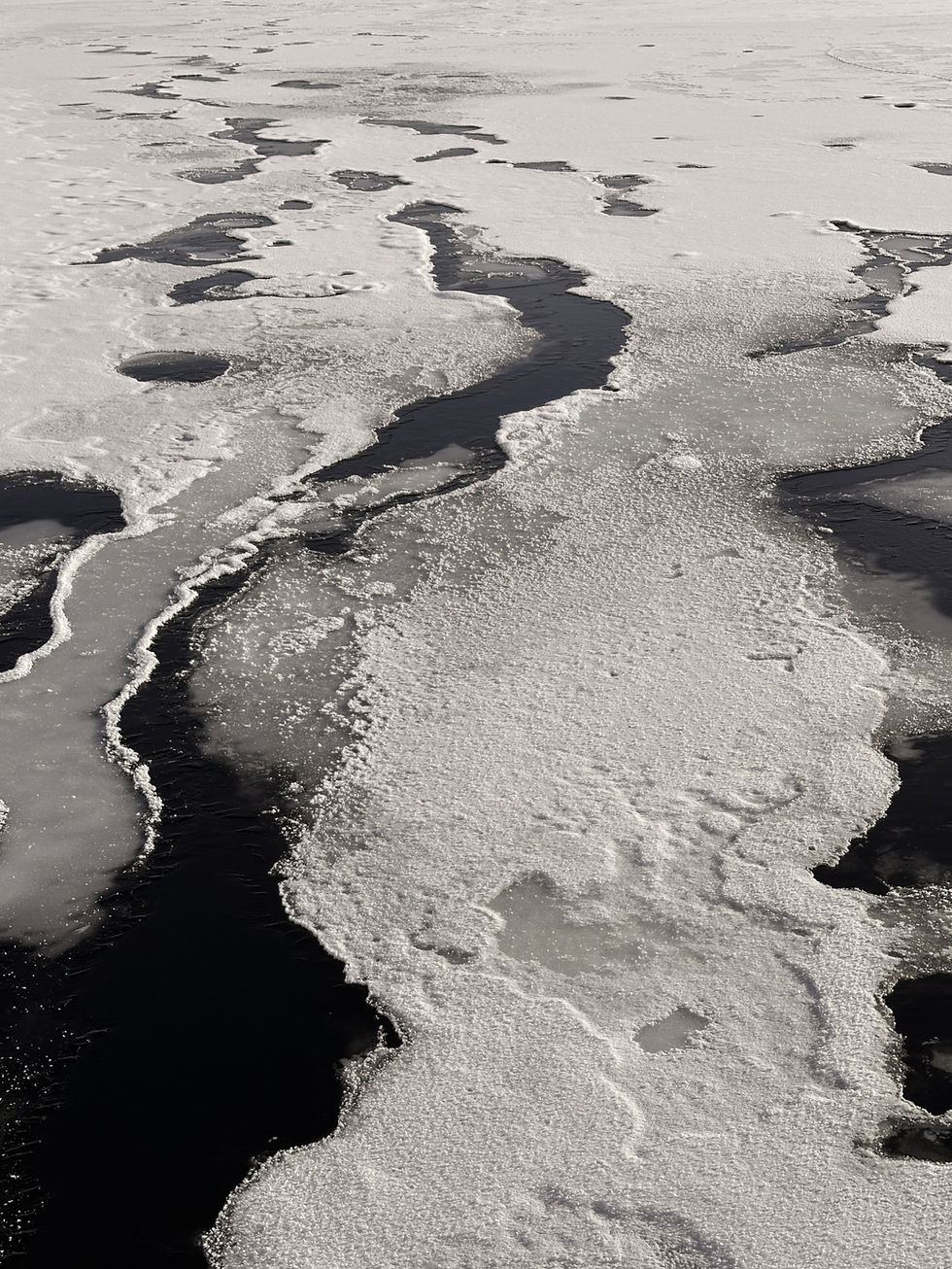 Frozen river landscape in Swedish Lapland