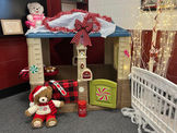 Christmas decorated playhouse with teddy bears