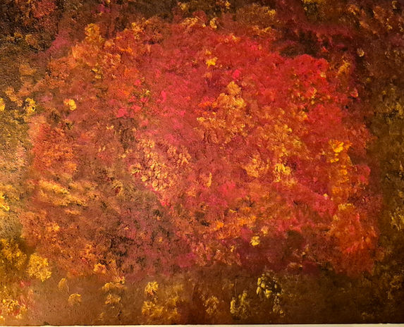 Peinture abstraite aux couleurs vives et chaudes.