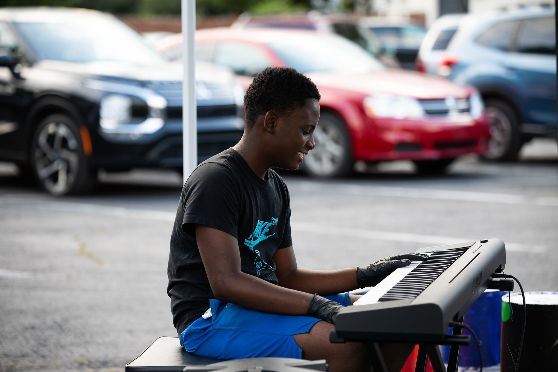 Student on the keyboard at Pop-Up / Speak-Up