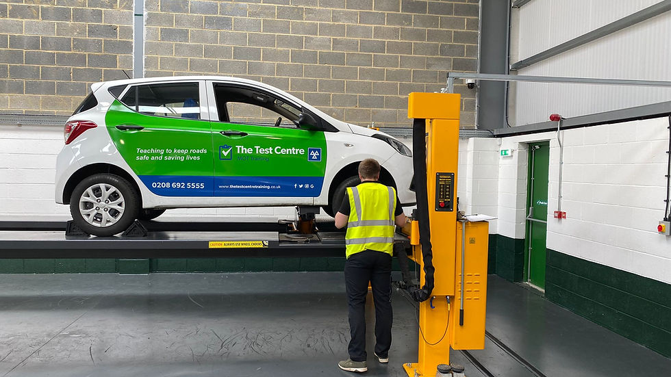 Close-up view of a vehicle brake system being inspected