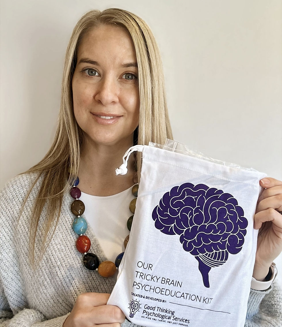 Dr Marianne Trent holding the Our Tricky Brain Kit