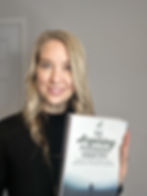 Dr Marianne holding Aspiring Psychologist photo