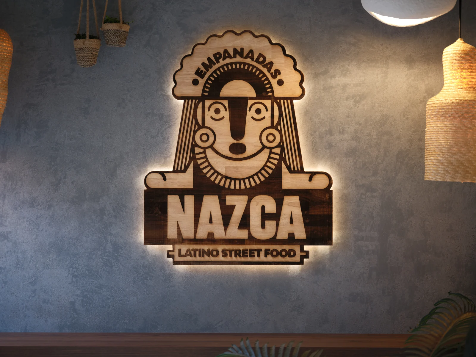 Le personnage et le logo Nazca en décoration murale dans le magasin