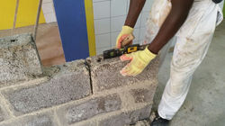 1 male_boy leveling the bricks