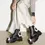 Thumbnail: DR. MARTENS SINCLAIR FLOWER PISA LEATHER PLATFORM BOOTS