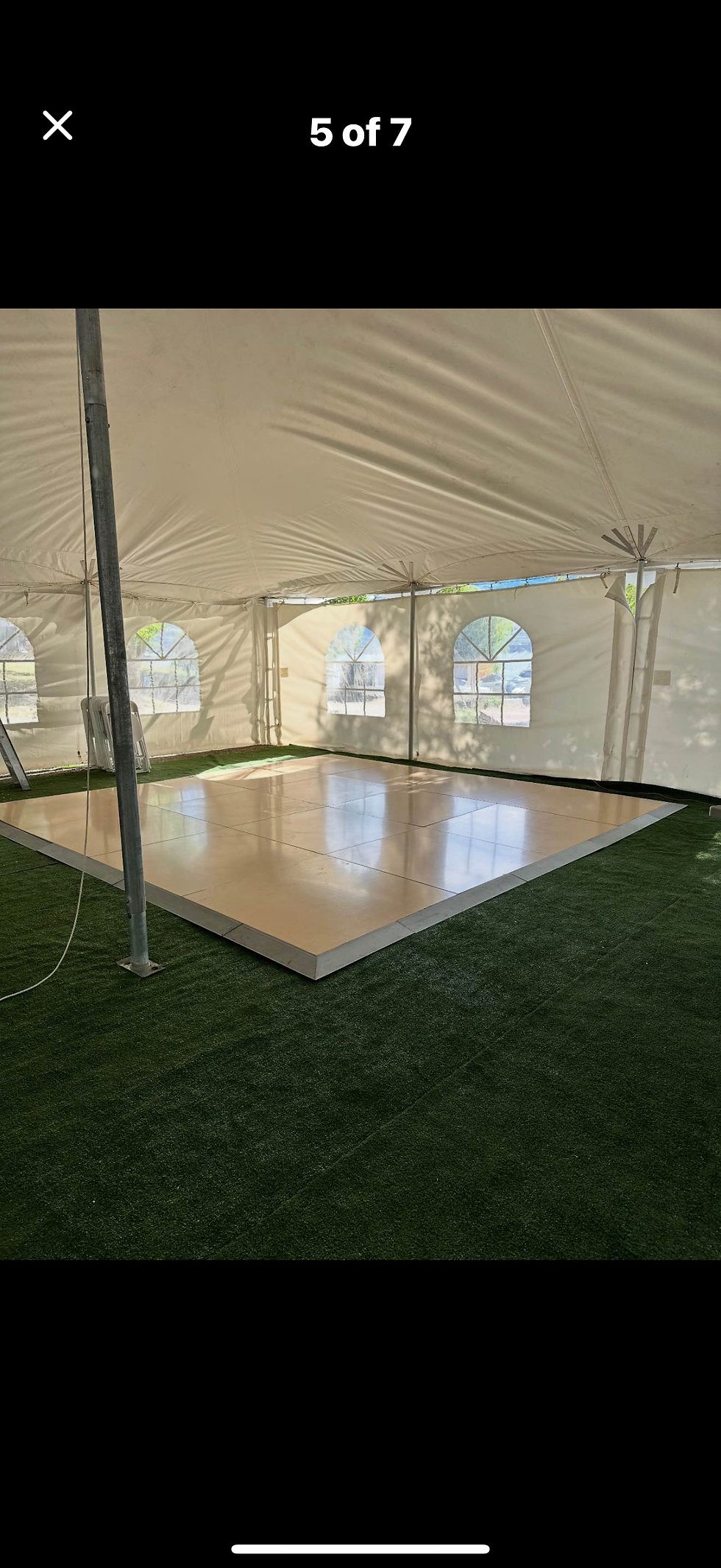 Clean and simple 400 sq ft dance floor setup inside a white event tent