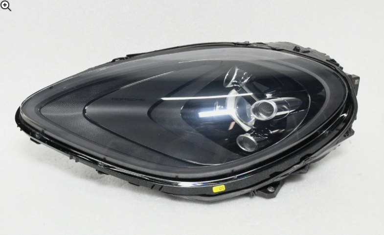 After 2019–2021 Porsche Macan 95B.2 headlight lens replacement in Dallas–Fort Worth restored to clear, like-new lenses, natio