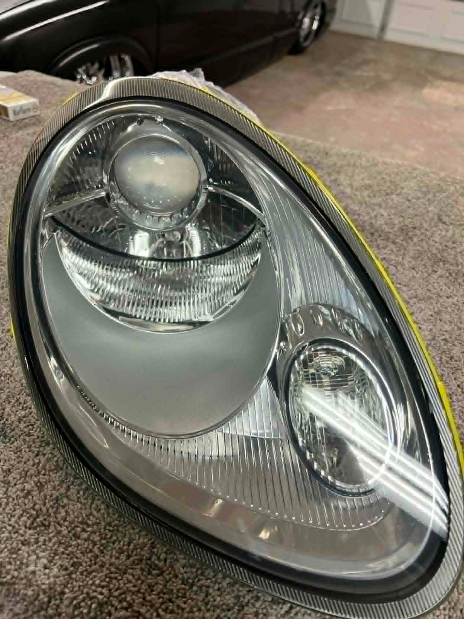 After 2005–2012 Porsche Cayman & Boxster 987 headlight lens replacement with clear, like-new finish and optional projector up