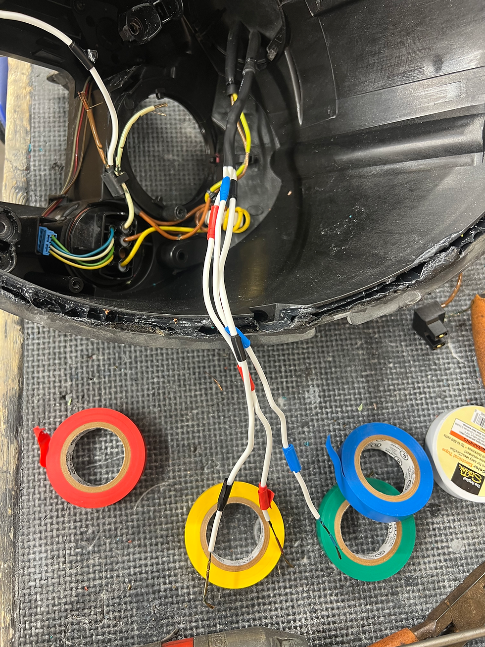 Thumbnail: Technician repairing faulty wiring during Mini Cooper S headlight restoration process