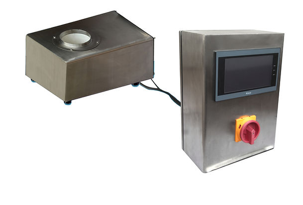 A box drop metal detector that senses metal in products such as grains and powders.