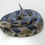 Thumbnail: Handcrafted rattlesnake replica with detailed scale patterns and lifelike colors.